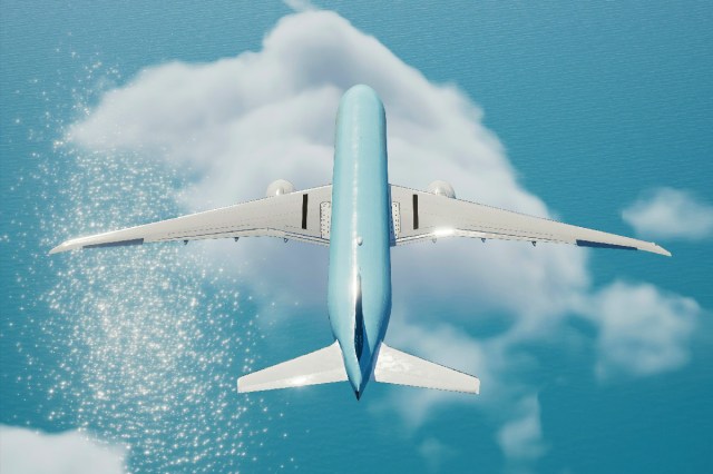 A blue and white airplane seen from above 