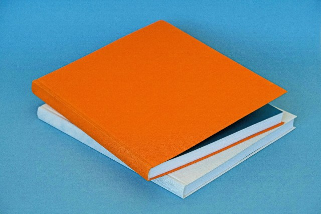 Two books on a blue background