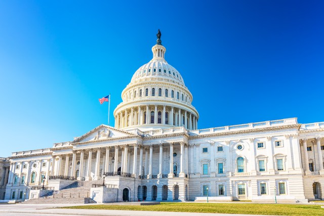 US Capitol building over blue sky