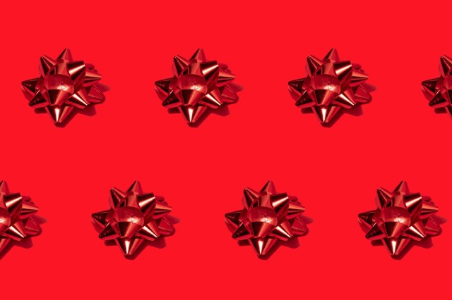 A pattern of red shiny bows